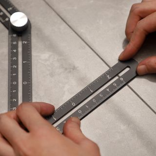 HUMMER ไม้บรรทัด 6 พับ สำหรับวัดตำแหน่งเจาะรูกระเบื้อง  รุ่น JGDW0703  3 ขนาด 25/40/45MM  (10.7X104X1.8cm)