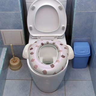 Primo Kids ฝารองนั่งเด็กพร้อมมือจับและแผ่นกันน้ำกระเด็น รุ่น Bear TS01B สีเบจ ลายหมี