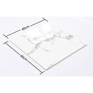 Marbella กระเบื้องเซรามิคปูพื้น 40X40 ซม. รุ่น โนร่าไวท์ DJ002 Random Gloss (12P)