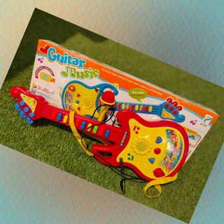 TOYS ของเล่นกีต้าร์พร้อมไมค์โครโฟน รุ่น 1334933 ขนาด 15x44.5x4 ซม.คละสี